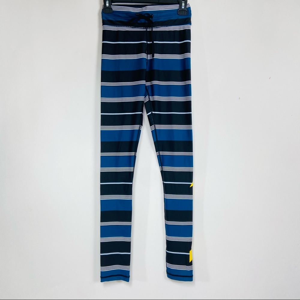 The upside striped arrow leggings. Size Small